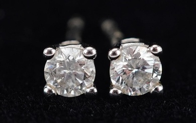 Pair of 9ct white gold diamond solitaire stud earrings with ...