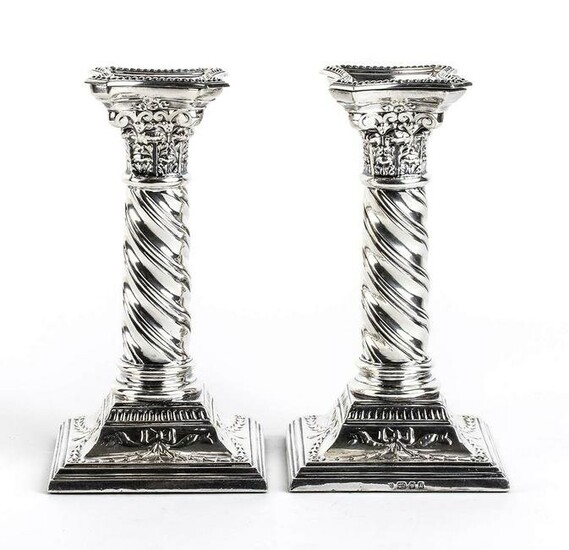 Pair of English sterling silver candlesticks - London