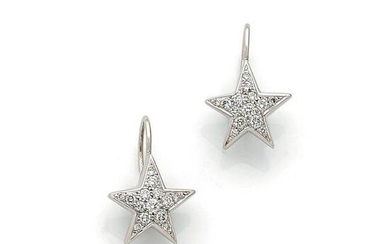Pair of ‘star’ earrings in white gold 18K