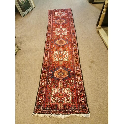 Persian Karaja hand knotted wool rug. {285 cm L x 67 cm W}.