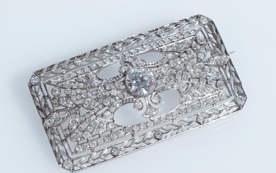 Platinum and Diamond Brooch, Gross weight: 7.7 dwt., Length: 1 in (2.5 cm), Width: 1-3/4 in (4.4 cm)