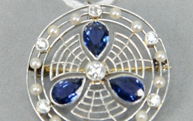 Platinum circular brooch set with three tear drop blue