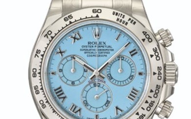 ROLEX. A RARE AND ATTRACTIVE 18K WHITE GOLD AUTOMATIC CHRONOGRAPH WRISTWATCH WITH TURQUOISE DIAL, GUARANTEE AND BOX