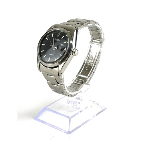 ROLEX, OYSTER DATE, A STAINLESS STEEL GENT’S WRISTWATCH Circ...