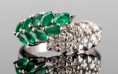 Ring with emeralds and diamonds.