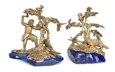Robert Kohun: Two Russian silver-gilt figurines on lapis lazuli bases. 84 standard. H. 12 cm and 13 cm. (2).