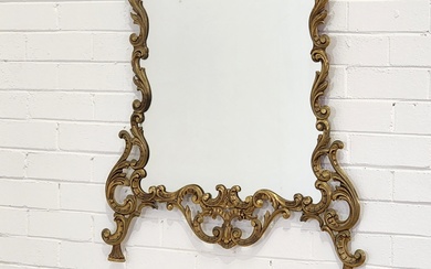 Rococo style brass wall mounted consol table and mirror, with...