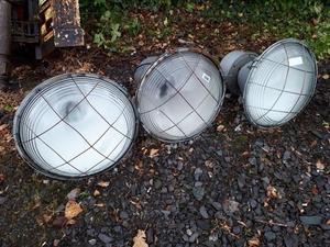 Set of three 1950's industrial hanging lamps.