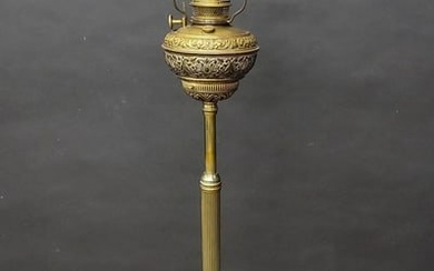 Signed Bradley & Hubbard Oil Adjusting Floor Lamp with cast brass legs and brilliant cut glass crown