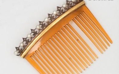 Silver and blond tortoiseshell bun comb, decorated with...