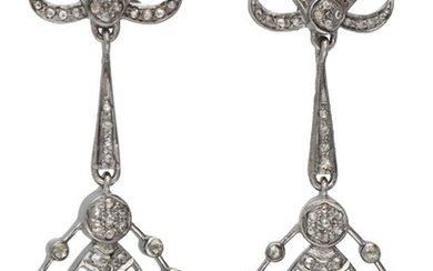 Sterling silver earrings set with rose cut diamonds.