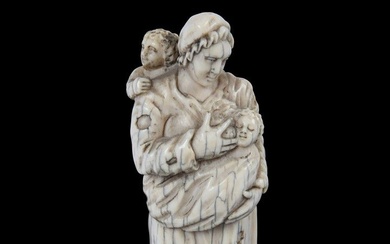 Sujet en ivoire d'éléphant (elephantidae spp.) sculpté, "Maternité", femme debout vêtue de haillons allaitant un...