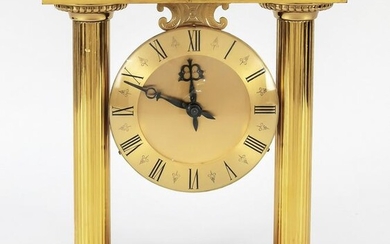 Table clock brass gilded with