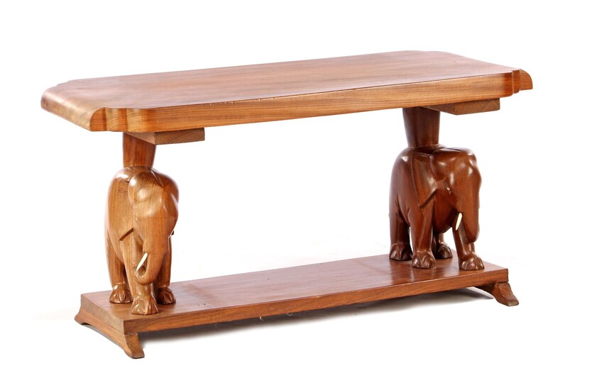 (-), Teak coffee table with harassed elephants as...