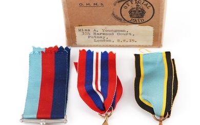 Three British military World War II medals with box of issue...