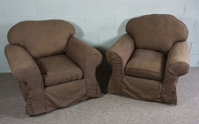 Two brown fabric covered arm chairs