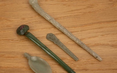 Two jade hairpins Chinese, 18th/19th Century including a pale green...