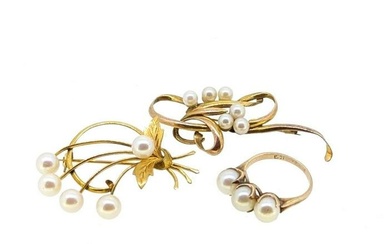 Two pearl brooches, together with a pearl ring, first, the floral brooch set with five pearls