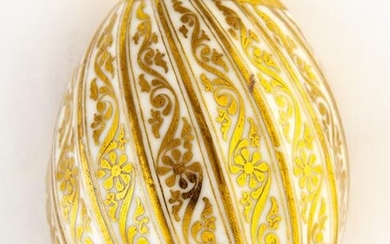 UNUSUALLY STRUCTURED RUSSIAN PORCELAIN EASTER EGG IN GOLD AND WHITE