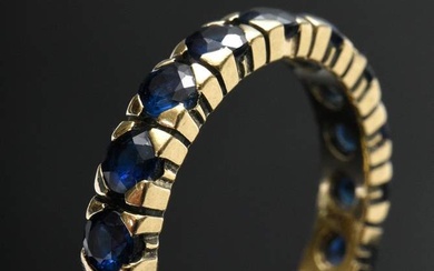 Yellow gold 585 memory ring with faceted sapphires, 3.2