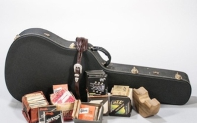 Large Group of Guitar Accessories, including strings, straps, stands, and cases.Provenance: The estate of J. Geils.
