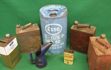 25 litre Esso oil can, two 2 gallon Shellmex cans one with castellated cap the other plain, two oil cans and a Gulf pourer...