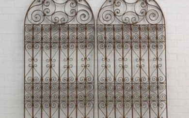 A pair of Baroque style wrought iron panels