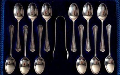 A cased set of twelve silver teaspoons and matching