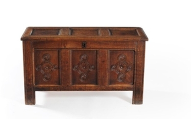 A Charles II panelled oak chest