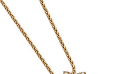 A diamond and 18k gold pendant and chain