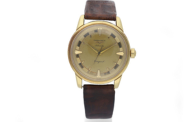 Longines. A Yellow Gold Wristwatch with Faceted Crystal