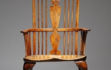 A mid 18th century and later yew Windsor armchair …