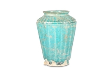 A TURQUOISE-GLAZED POTTERY VASE Iran, 12th - 13th...