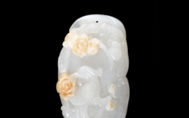 A white jade carving of a long-tailed phoenix with flowers, some inclusions to the stone China, early 20th century (l....