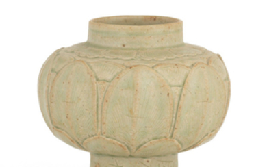 A rare Yueyao celadon-glazed inscribed 'lotus' jar