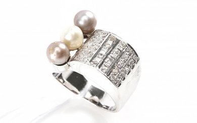 A RETRO STYLE PEARL AND DIAMOND RING IN WHITE GOLD
