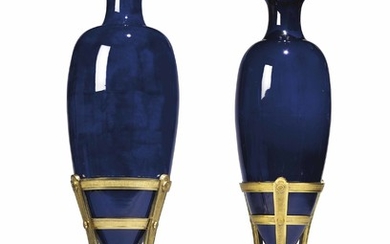 A PAIR OF LOUIS XVI ORMOLU, WHITE MARBLE AND DARK BLUE-GROUND 'LACRIMAL' VASES ON STANDS, THE MOUNTS ATTRIBUTED TO JEAN-CLAUDE-CHAMBELLAN DUPLESSIS, ONE VASE SEVRES HARD-PASTE PORCELAIN, CIRCA 1782, THE OTHER A ROYAL DOULTON REPLACEMENT, CIRCA 1892