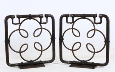 A pair of Art Deco wrought iron transom...