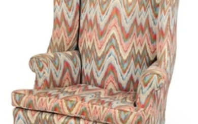 COUNTRY CHIPPENDALE WING CHAIR Strong tiger maple block legs joined with H-stretcher. Flame-stitch upholstery. Back height 45.75". S...