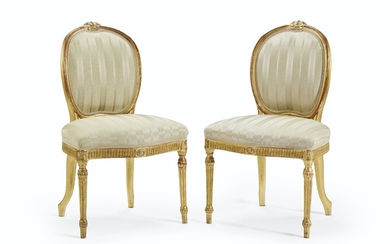 A PAIR OF GEORGE III GILTWOOD SIDE CHAIRS, IN THE MANNER OF MAYHEW AND INCE, CIRCA 1775