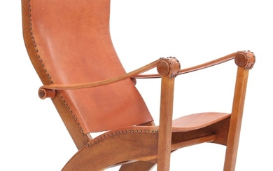 Mogens Voltelen: “Københavnerstolen”. Easy chair with oak frame. Seat, back and armrests of full grain leather fitted with nails.