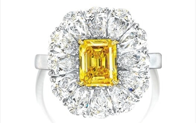 A Fancy Vivid Orangy Yellow Diamond and Diamond Ring