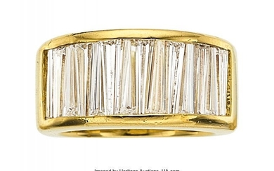 55013: Diamond, Gold Ring The ring features tapered b