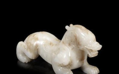 A mottled white jade Han-style carving of a bixie