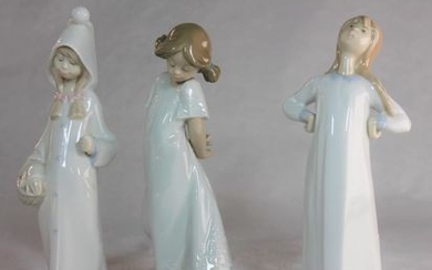 Lladro figure of girl in night clothes; two Nao figures of children (3)