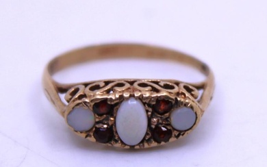 9ct Yellow Gold Opal and Garnet Ring. The ring contains...