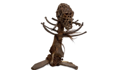 A 19TH CENTURY AFRICAN WITCH DOCTOR STAFF (FETISH) FORMED FROM MONKEY REMAINS
