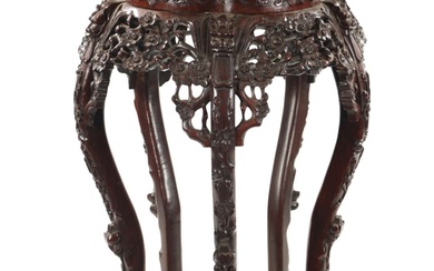 A 19TH CENTURY CHINESE CARVED HARDWOOD JARDINIERE STAND the...