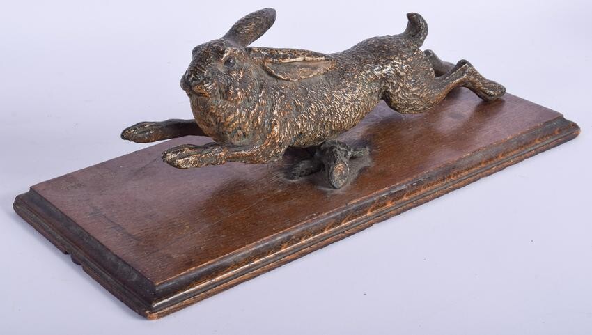 A 19TH CENTURY CHINESE COLD PAINTED BRONZE HARE PAPER