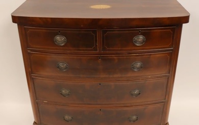 A 19th Century Mahogany Inlaid Bow Front Dresser.